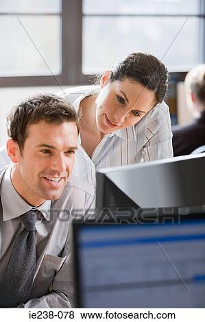 Colleagues talking View Large Photo Image Stock Photo - Colleagues talking. Fotosearch