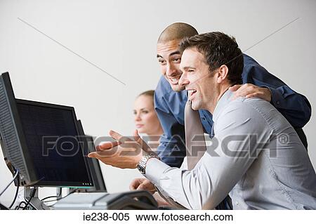 Colleagues talking View Large Photo Image Stock Photography - Colleagues talking. Fotosearch