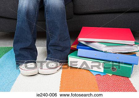 Human legs and ring binders View Large Photo Image Stock Photograph - Human legs and ring binders. Fotosearch
