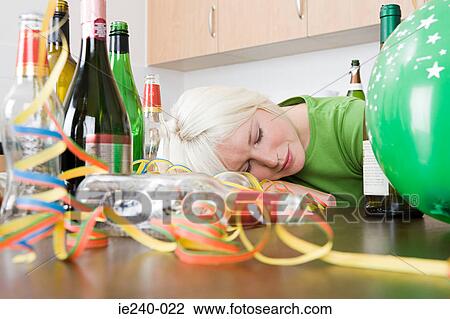 Woman sleeping after a party View Large Photo Image Stock Image - Woman sleeping after a party. Fotosearch