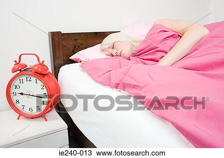 Young woman sleeping View Large Photo Image Stock Image - Young woman sleeping. Fotosearch
