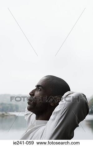 Stock Photo - A man thinking. Fotosearch
