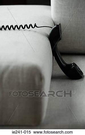 Stock Photography - Telephone and a sofa. Fotosearch