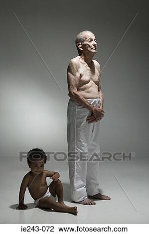 Stock Image - Elderly man and toddler. Fotosearch