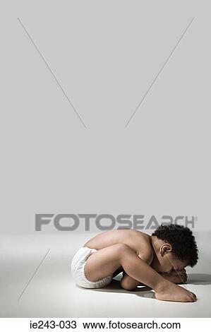 Male toddler sleeping on the floor View Large Photo Image Stock Image - Male toddler sleeping on the floor. Fotosearch