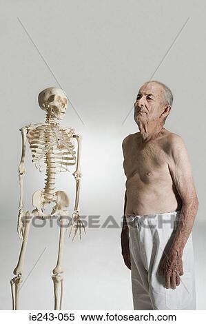 Senior man and a skeleton View Large Photo Image Stock Photography - Senior man and a skeleton. Fotosearch