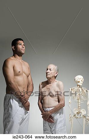Picture - Two men and a skeleton. Fotosearch