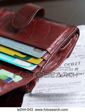 Stock Image - A purse and receipts. Fotosearch