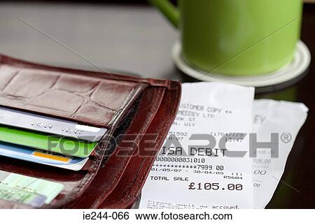 Stock Photograph - A purse and receipts. Fotosearch