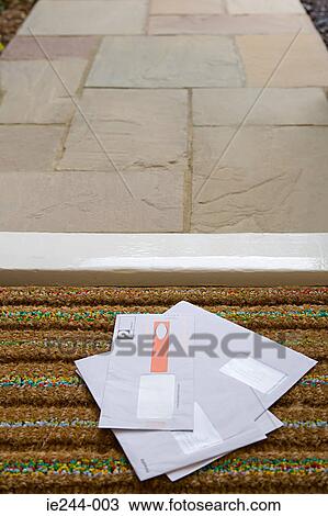 Stock Image - Mail on a doormat. Fotosearch