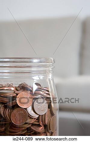 Pennies in a jar View Large Photo Image Stock Photo - Pennies in a jar. Fotosearch
