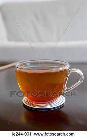 Stock Image - Tea in a transparent cup. Fotosearch