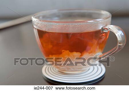 Tea in a transparent cup View Large Photo Image Stock Photo - Tea in a transparent cup. Fotosearch