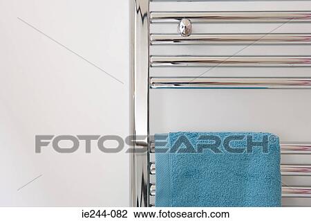 Stock Image - Towels drying on a radiator. Fotosearch