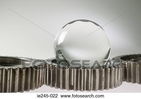 A crystal ball and machine cogs View Large Photo Image Stock Image - A crystal ball and machine cogs. Fotosearch