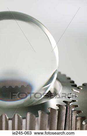 A crystal ball and machine cogs View Large Photo Image Stock Image - A crystal ball and machine cogs. Fotosearch
