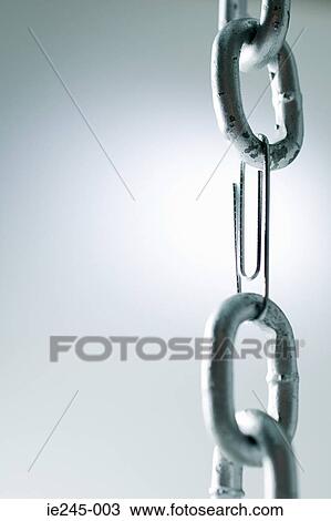 A paper clip in a metal chain View Large Photo Image Stock Image - A paper clip in a metal chain. Fotosearch