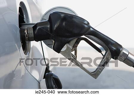 A petrol tank being filled View Large Photo Image Stock Image - A petrol tank being filled. Fotosearch
