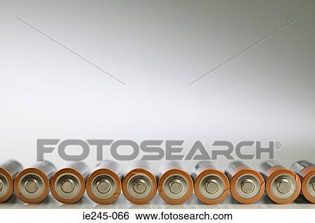 Batteries in a row View Large Photo Image Stock Photograph - Batteries in a row. Fotosearch