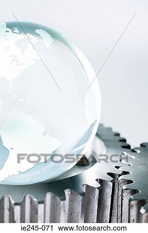 Planet earth and machine cogs View Large Photo Image Stock Image - Planet earth and machine cogs. Fotosearch