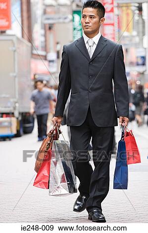 A man shopping in tokyo View Large Photo Image Stock Photo - A man shopping in tokyo. Fotosearch