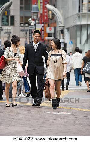Friends shopping in tokyo View Large Photo Image Stock Image - Friends shopping in tokyo. Fotosearch