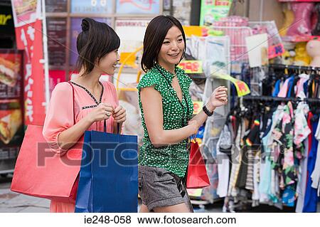 Friends shopping View Large Photo Image Stock Photo - Friends shopping. Fotosearch