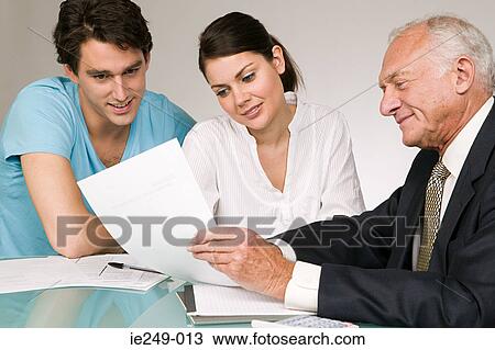 Couple and financial adviser View Large Photo Image Stock Image - Couple and financial adviser. Fotosearch