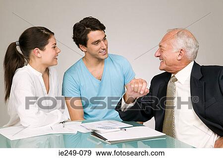 Couple and financial adviser View Large Photo Image Stock Photo - Couple and financial adviser. Fotosearch