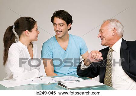 Couple and financial adviser View Large Photo Image Stock Photography - Couple and financial adviser. Fotosearch