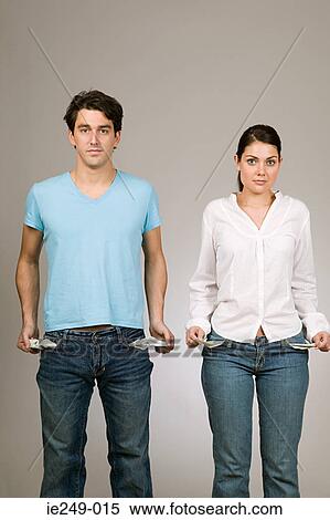 Stock Photography - Couple with empty pockets. Fotosearch
