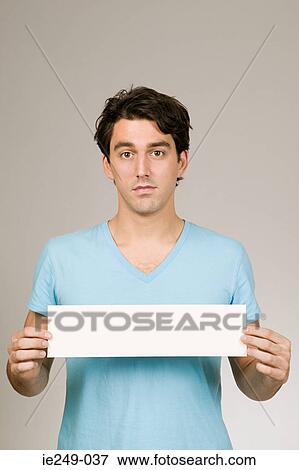 Man with a blank sign View Large Photo Image Stock Photo - Man with a blank sign. Fotosearch