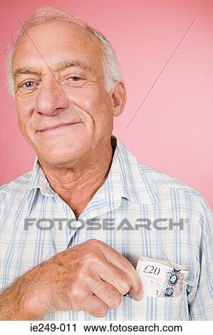 Man with banknotes in his pocket View Large Photo Image Stock Image - Man with banknotes in his pocket. Fotosearch