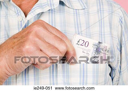 Man with banknotes in his pocket View Large Photo Image Stock Image - Man with banknotes in his pocket. Fotosearch