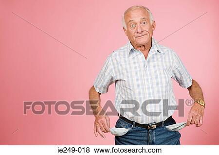 Man with empty pockets View Large Photo Image Stock Photo - Man with empty pockets. Fotosearch