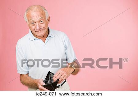 Man with empty wallet View Large Photo Image Stock Image - Man with empty wallet. Fotosearch