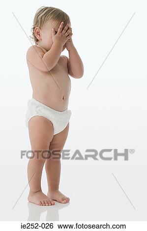 Baby covering face View Large Photo Image Stock Photograph - Baby covering face. Fotosearch