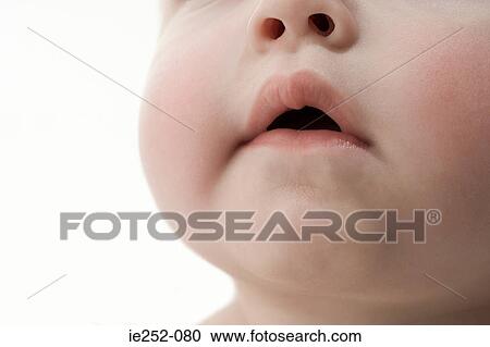 Close up of baby face View Large Photo Image Stock Image - Close up of baby face. Fotosearch