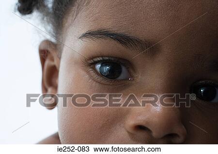 Close up of face of baby girl View Large Photo Image Stock Image - Close up of face of baby girl. Fotosearch