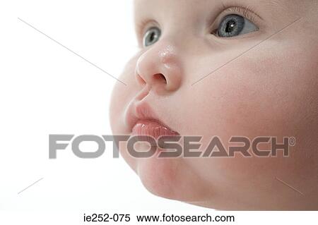 Face of a baby View Large Photo Image Stock Photography - Face of a baby. Fotosearch