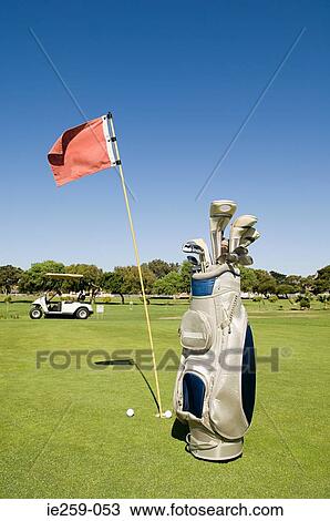 A golf bag on a golf course View Large Photo Image Stock Image - A golf bag on a golf course. Fotosearch