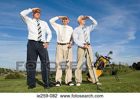 Businessmen playing golf View Large Photo Image Stock Image - Businessmen playing golf. Fotosearch