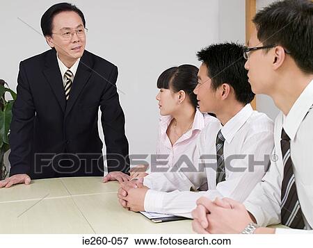 Businessman in meeting View Large Photo Image Stock Photo - Businessman in meeting. Fotosearch