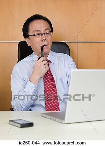 Picture - Businessman with pipe. Fotosearch