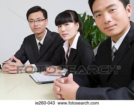 Businesspeople in meeting View Large Photo Image Stock Image - Businesspeople in meeting. Fotosearch