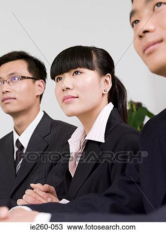 Businesspeople in meeting View Large Photo Image Stock Image - Businesspeople in meeting. Fotosearch