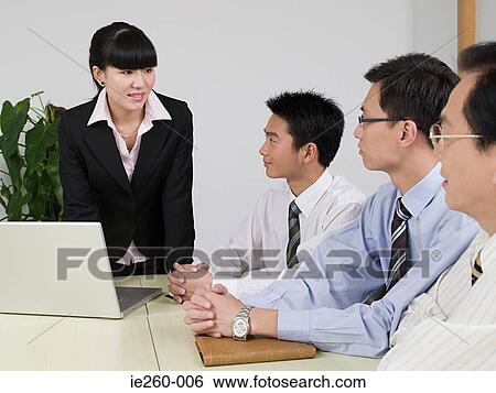 Businesspeople in meeting View Large Photo Image Stock Photograph - Businesspeople in meeting. Fotosearch