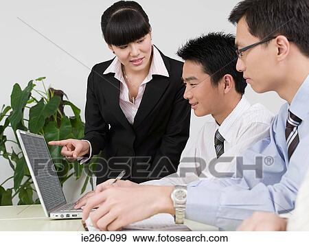 Stock Photo - Businesswoman giving presentation. Fotosearch