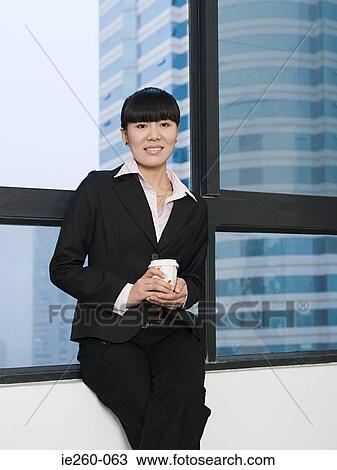 Businesswoman with coffee View Large Photo Image Stock Image - Businesswoman with coffee. Fotosearch