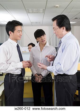 Colleagues in office View Large Photo Image Stock Image - Colleagues in office. Fotosearch